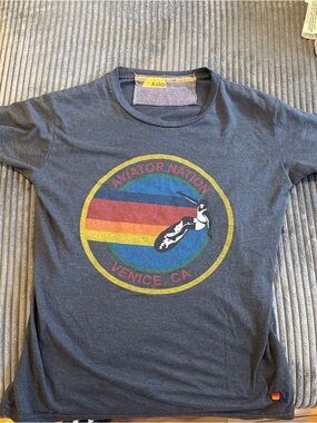 Aviator Nation Navy Tee with Red Orange Yellow Blue Stripe Surf Logo
